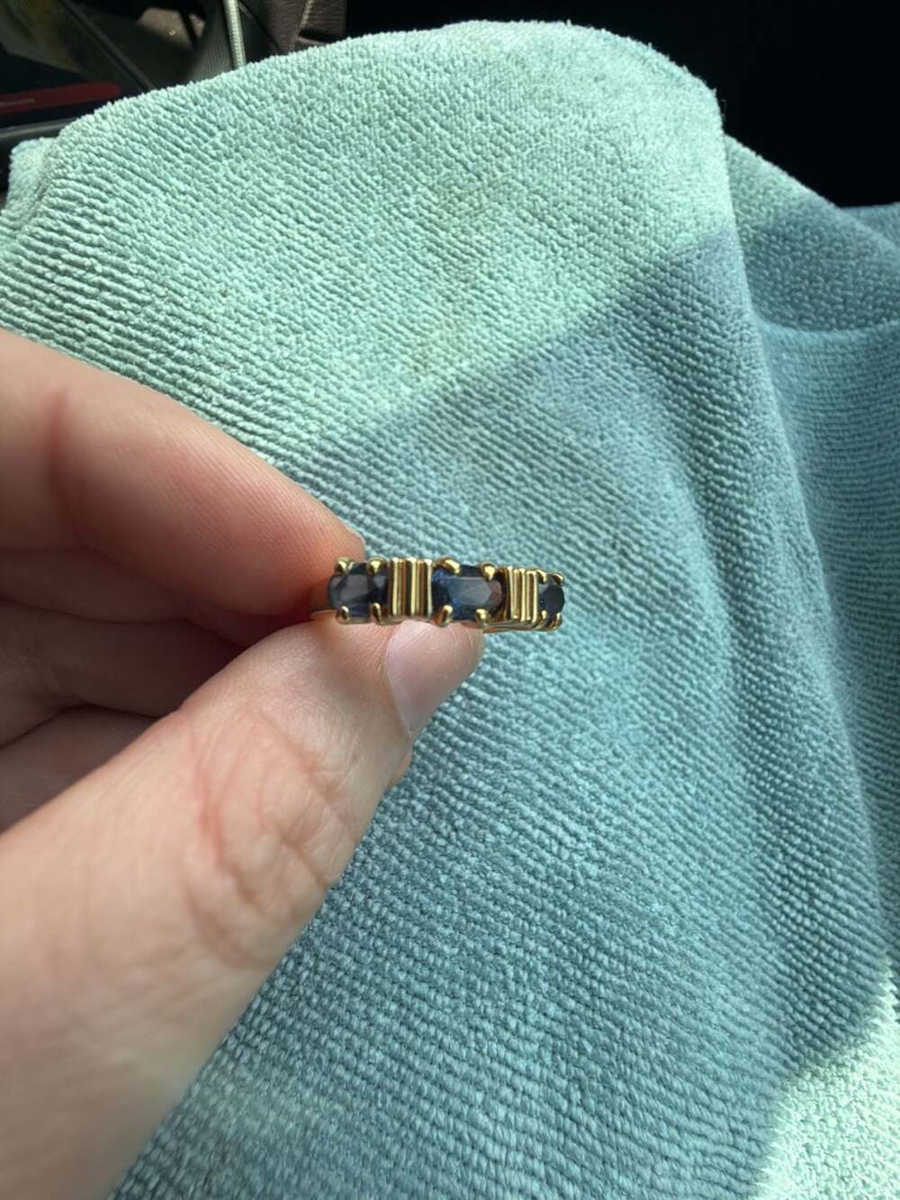 Vintage blue gemstone and gold tone ring with gold tone accents